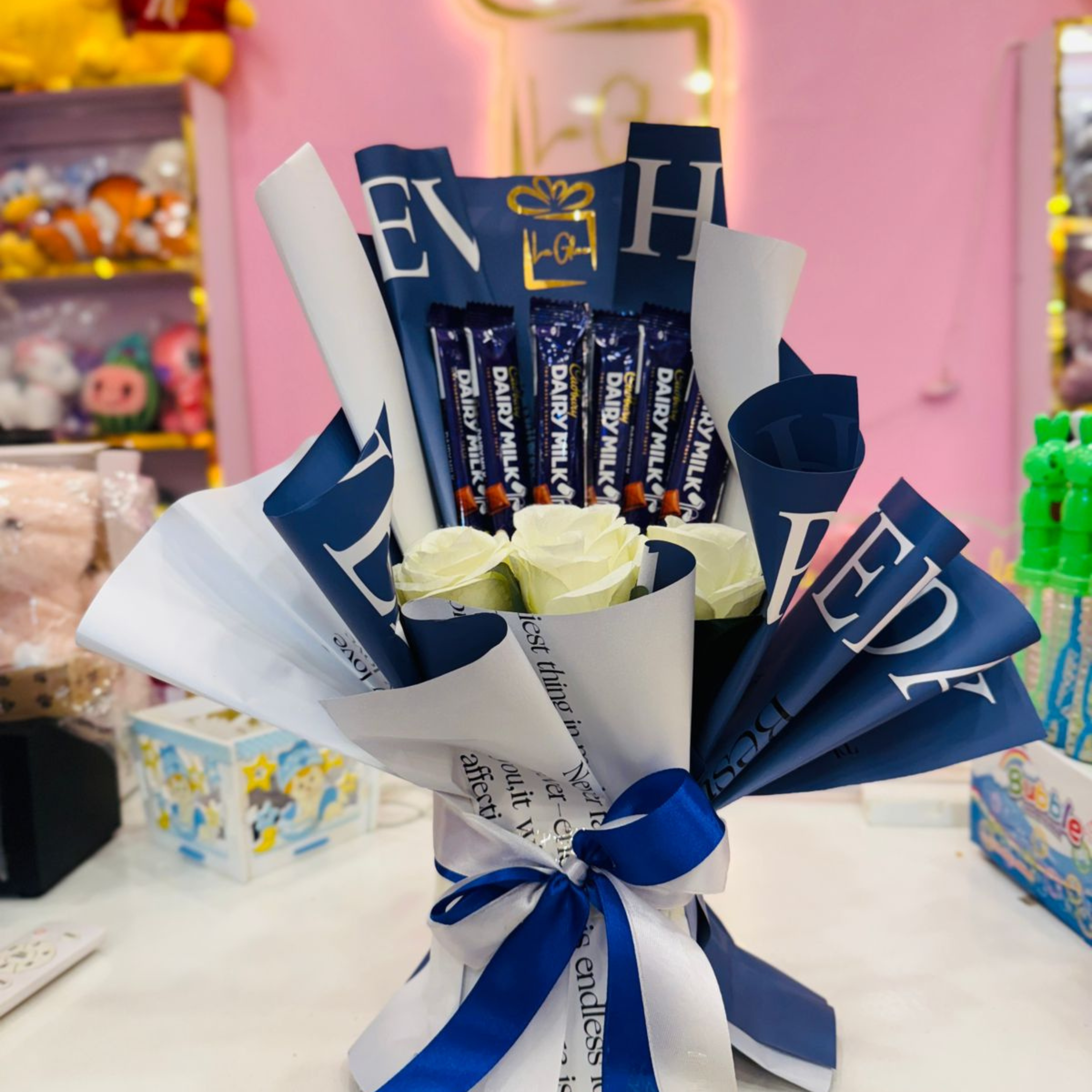 Luxury Cadbury Dairy Milk Chocolate and White Rose Gift Bouquet Secondary image