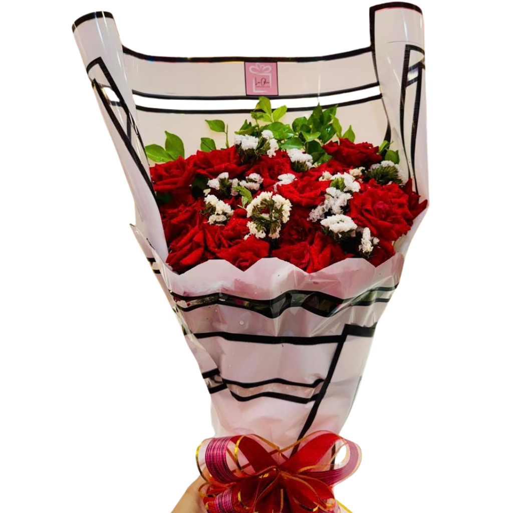 Red Roses and White Fillers with a Festive Satin Bow