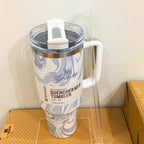 THE QUENCHER H2.0 FLOWSTATE™ TUMBLER | 40 OZ | POLAR SWIRL